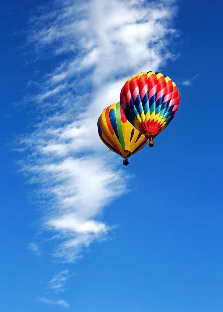 Two Balloons and Blue Sky