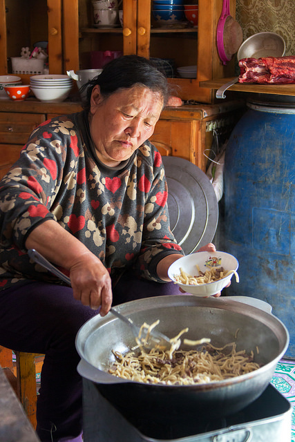 Grandmother Serving Lunch